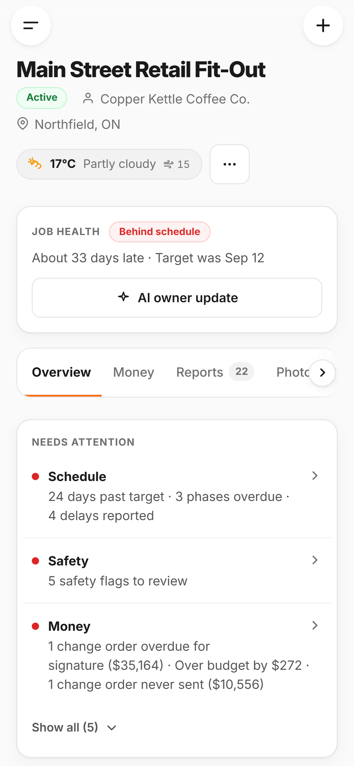 A job page on a phone: Main Street Retail Fit-Out, active, with its job health (behind schedule, about 33 days late) and what needs attention: schedule, safety and money, including a change order overdue for signature.